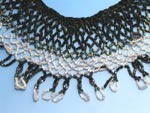 Collar made by James H. Riley in the 1870's. Elaborate collars commonly adorned women's dresses in the 1800's. It is not known if this was a one-of-a-kind gift for Sarah or if Jim made and sold collars when his health limited his physical activities. Lamont Crabtree Photo